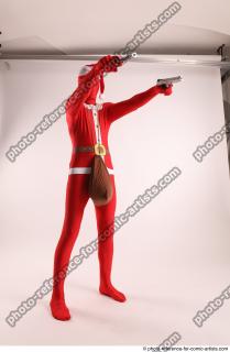 JOEL_ADAMSON CHRISTMAS VILLAIN WITH TWO GUNS